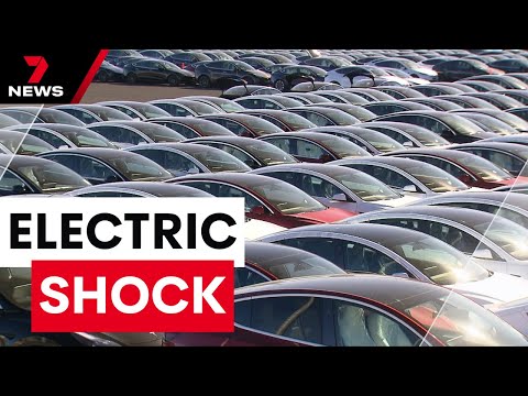 Thousands of electric cars sitting idle inside Tesla graveyard | 7 News Australia